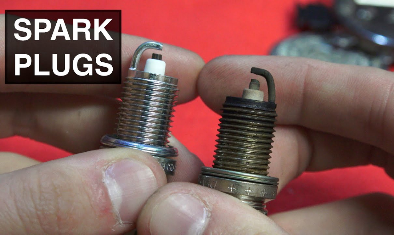 Why does a car idle rough after changing spark plugs?